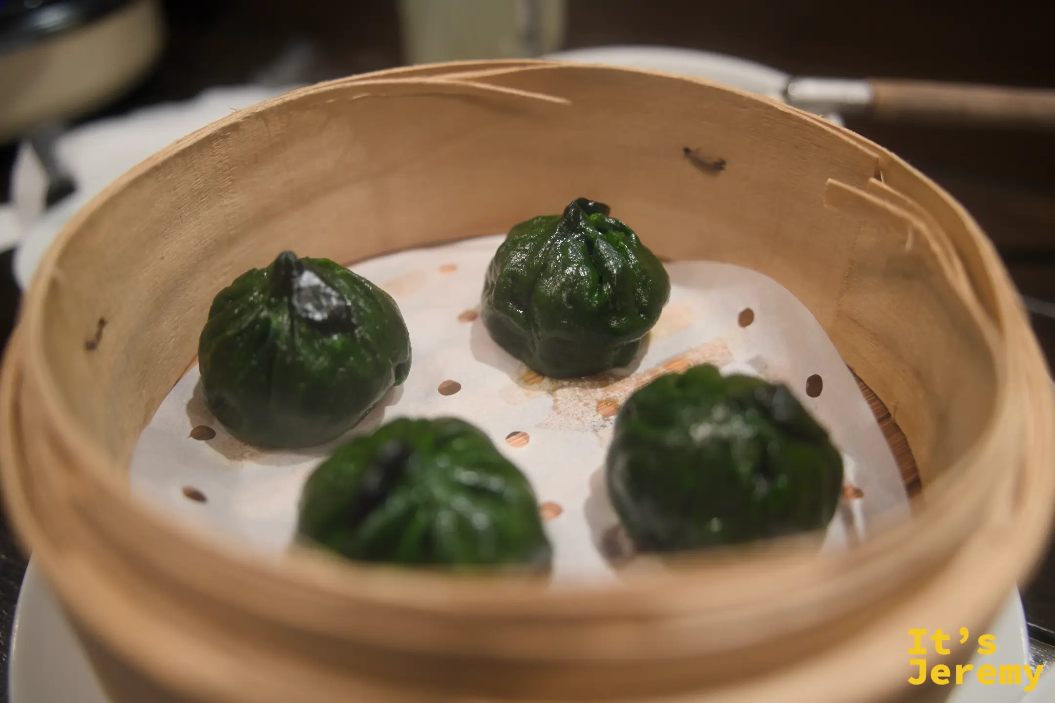 青柚子餃子,外皮深綠,同樣是小柚子造型