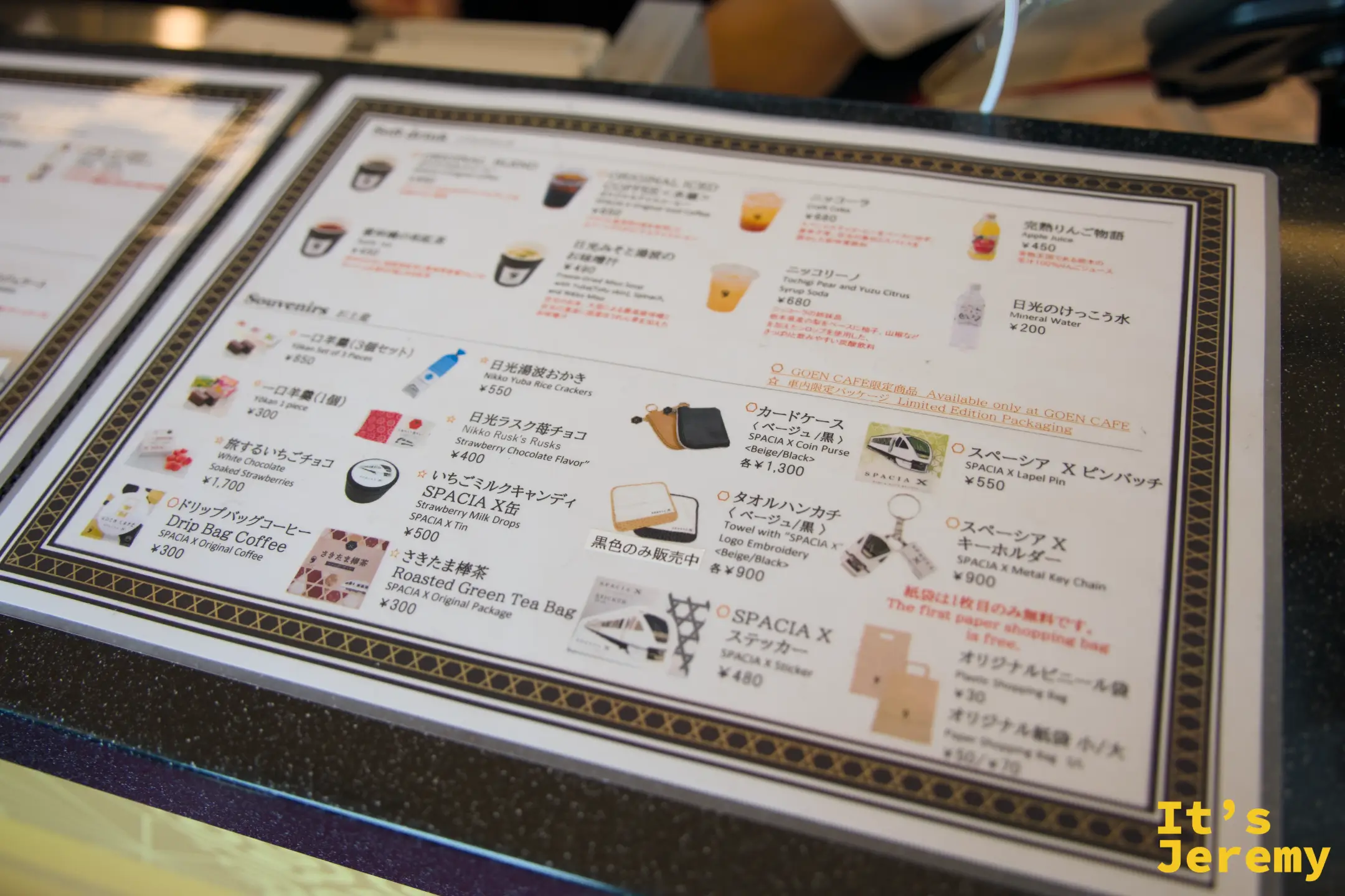 GOEN CAFÉ 菜單第二頁，可見 Soft drinks、Souvenirs 等品項，包含 SPACIA X 周邊商品、日光ラスク、ニッコーラ等