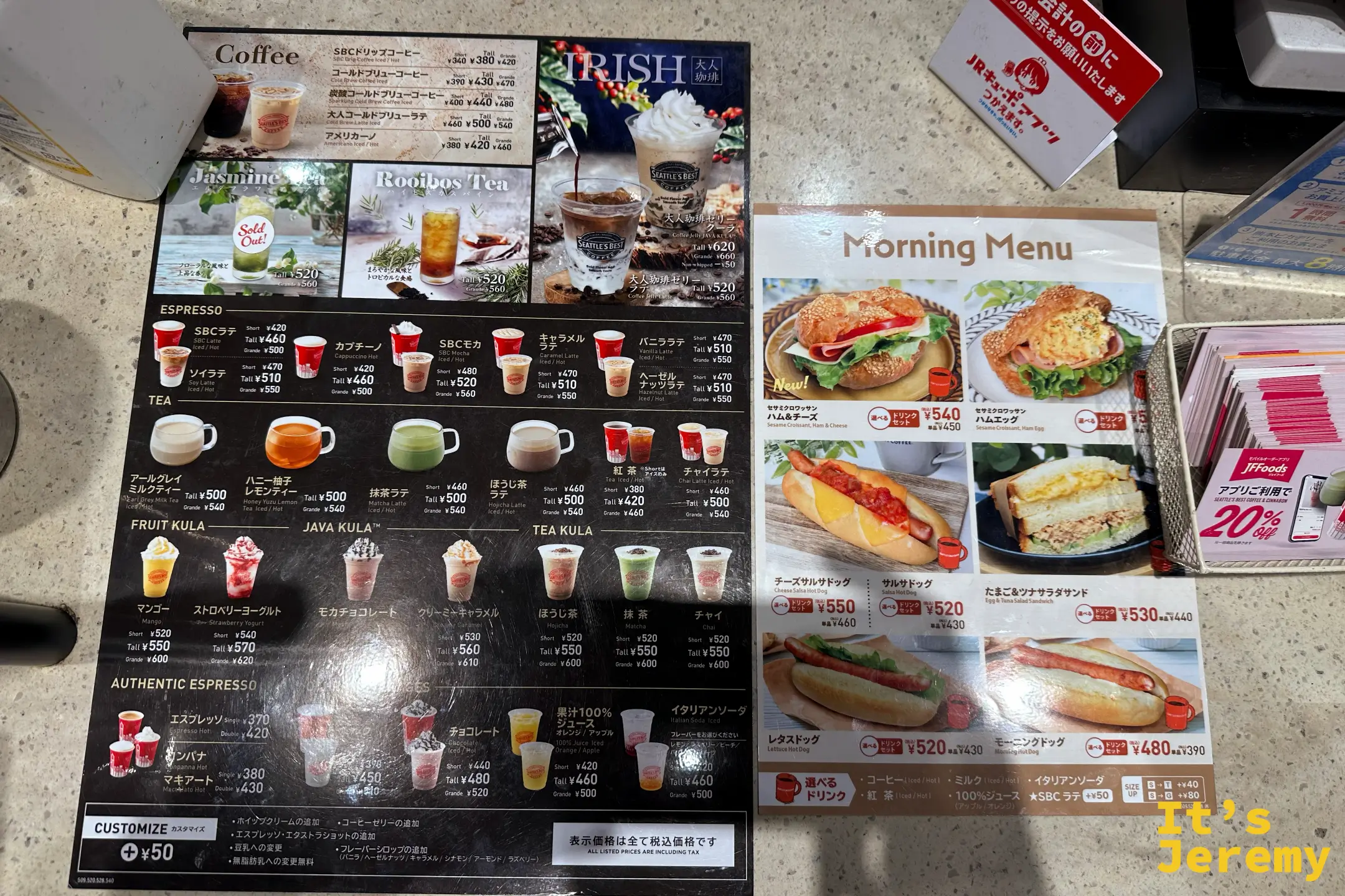 西雅圖極品咖啡熊本站店的菜單看板，陳列各式咖啡與輕食